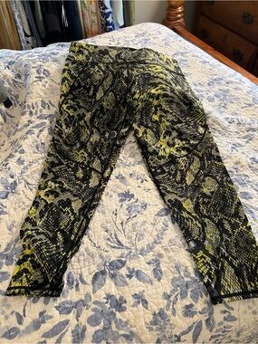 Sweaty Betty full length leggings in vibrant snakeskin print.